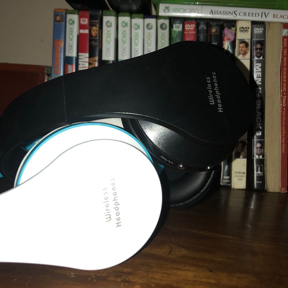 Black and white and blue Bluetooth Headphones